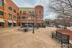 a view of a brick building with many windows