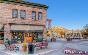 a view of a building with a street