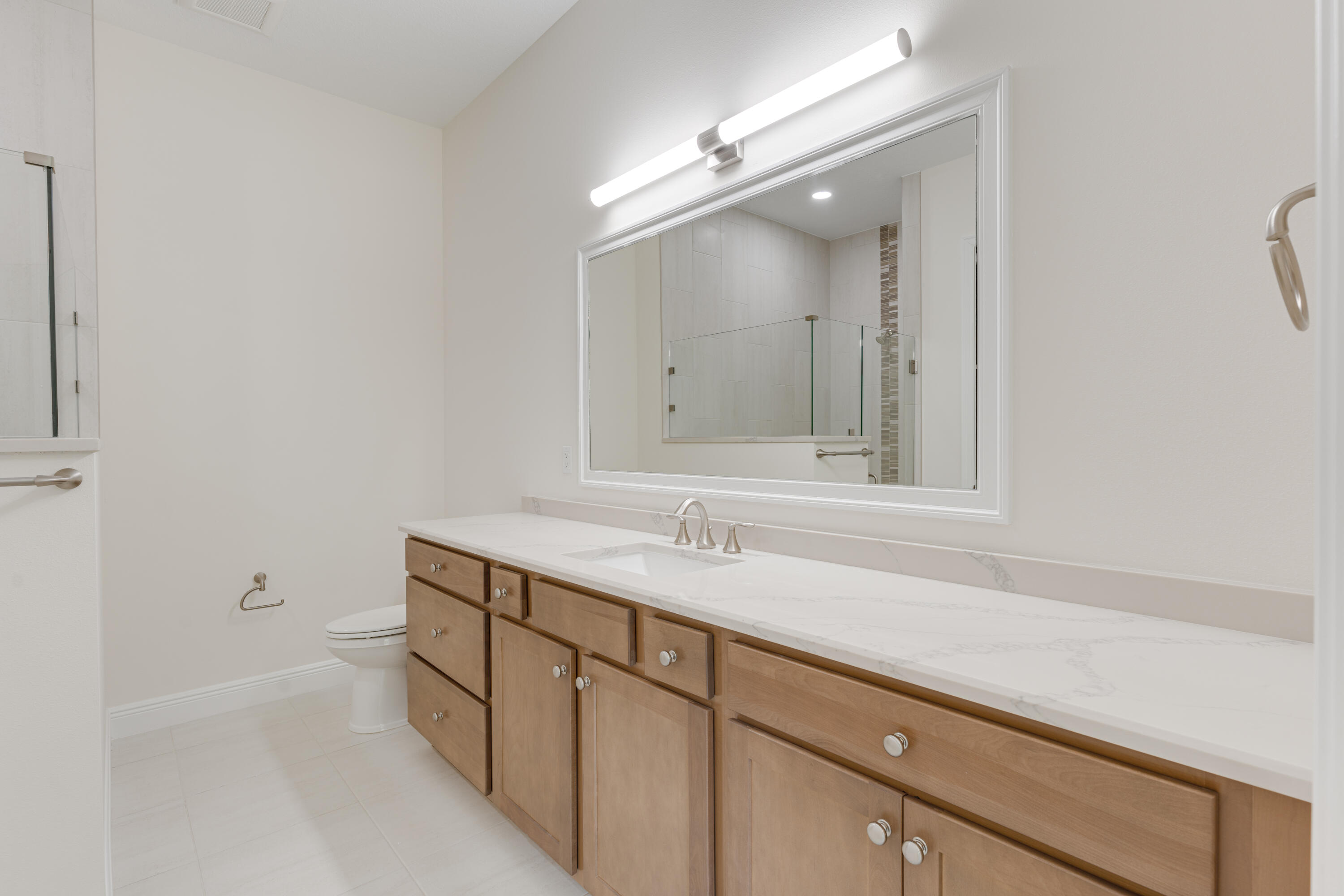 2005 Bridgepointe Circle, Unit 98 Vero Beach, FL 32967 - Photo 15 of 31 a bathroom with a sink and a mirror