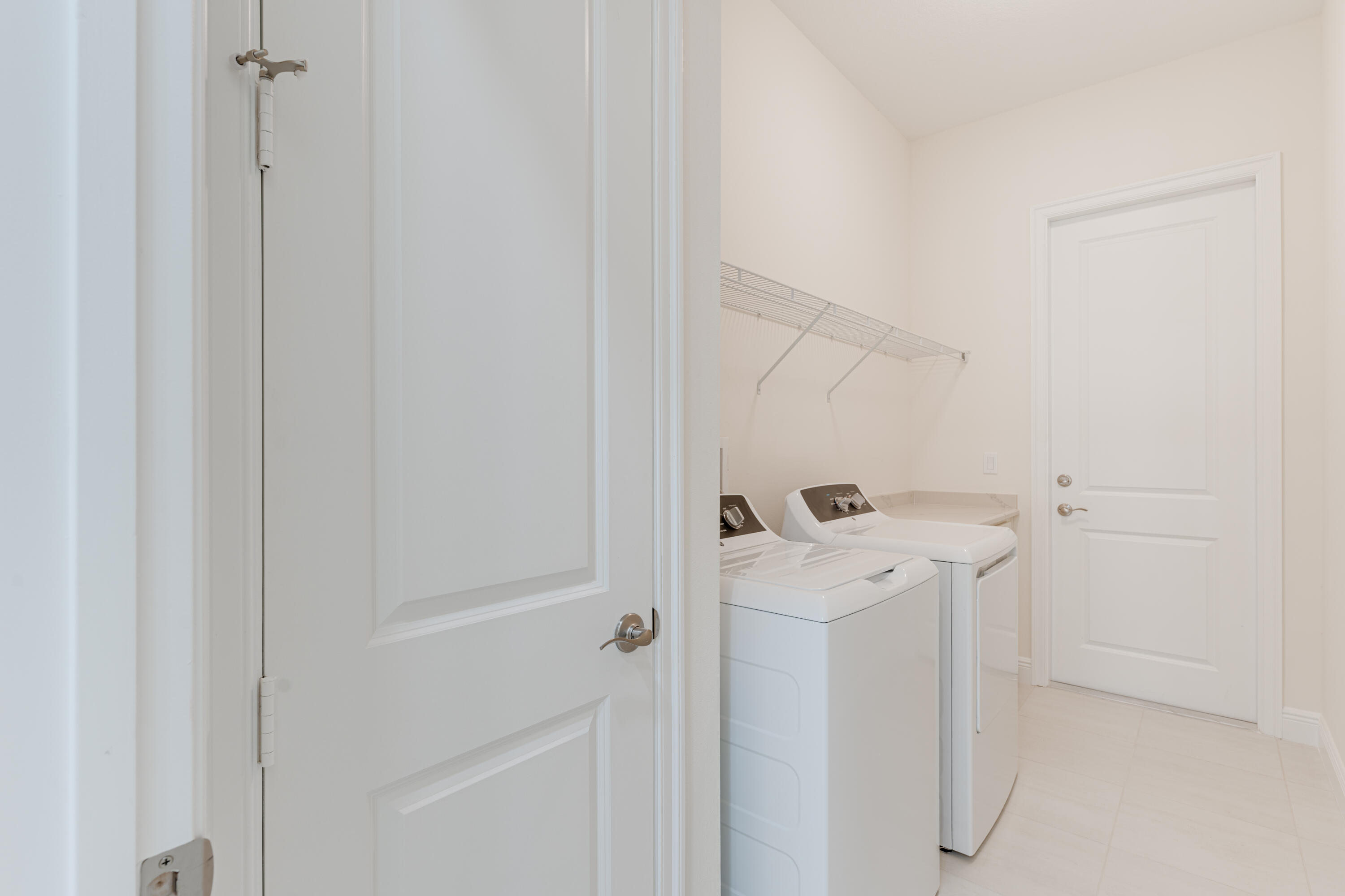 2005 Bridgepointe Circle, Unit 98 Vero Beach, FL 32967 - Photo 21 of 31 a view of small space with racks on the wall