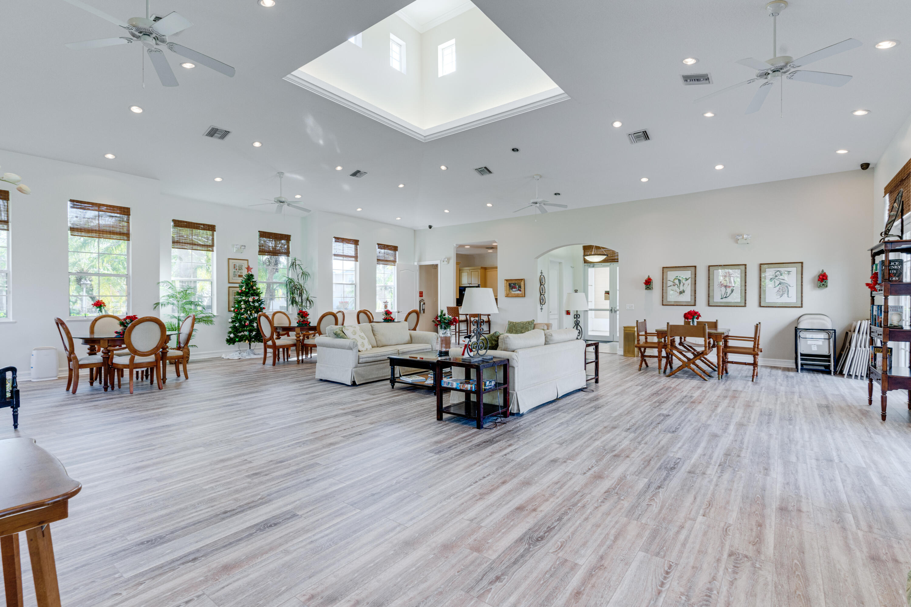 2005 Bridgepointe Circle, Unit 98 Vero Beach, FL 32967 - Photo 27 of 31 a living room with furniture and wooden floor