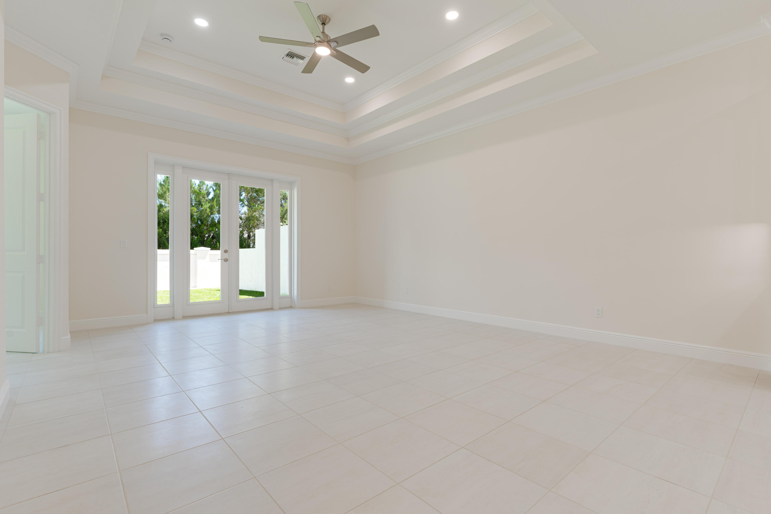 2005 Bridgepointe Circle, Unit 98 Vero Beach, FL 32967 - Photo 8 of 31 wooden floor in an empty room with a window
