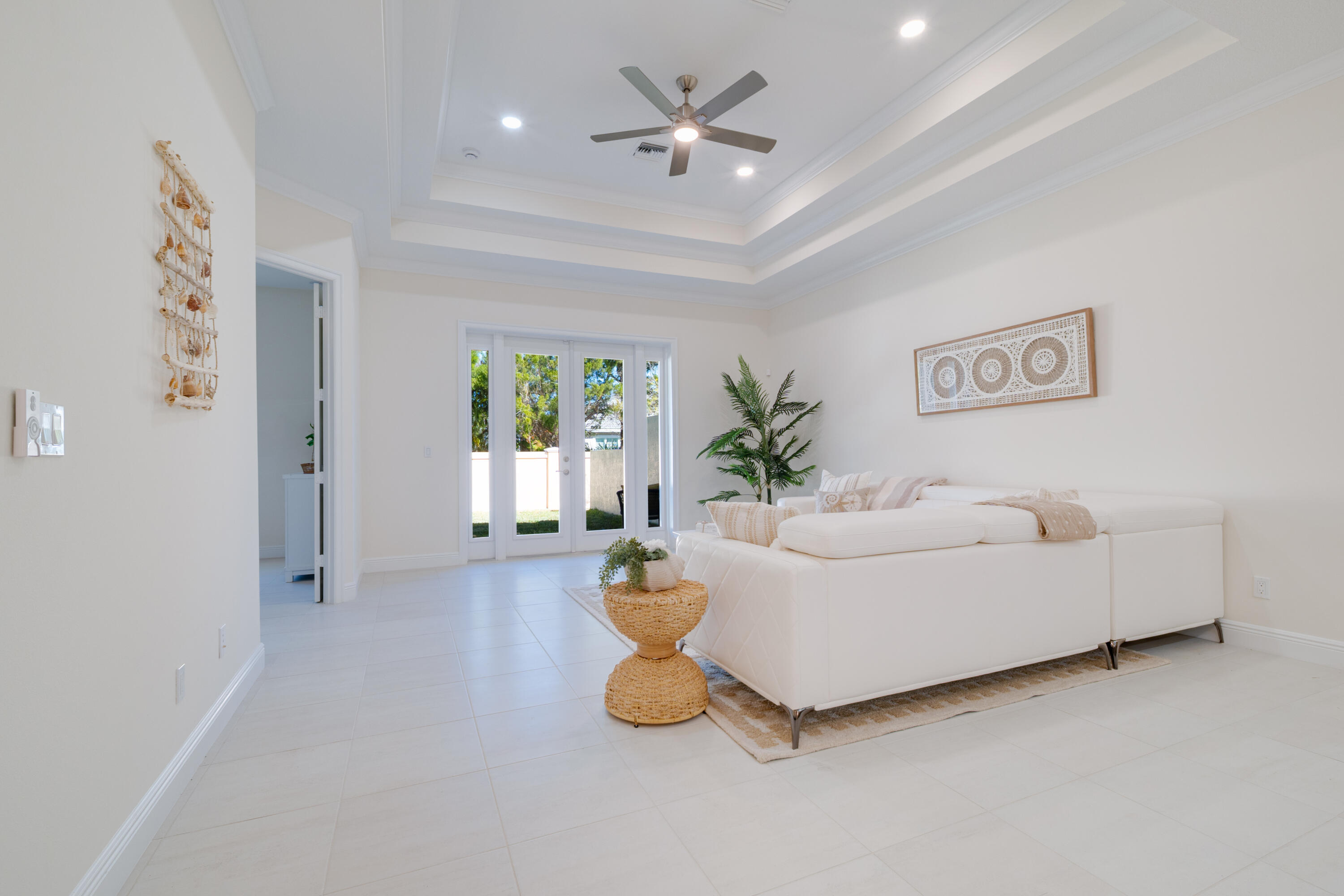 2005 Bridgepointe Circle, Unit 98 Vero Beach, FL 32967 - Photo 10 of 44 a living room with furniture and a window
