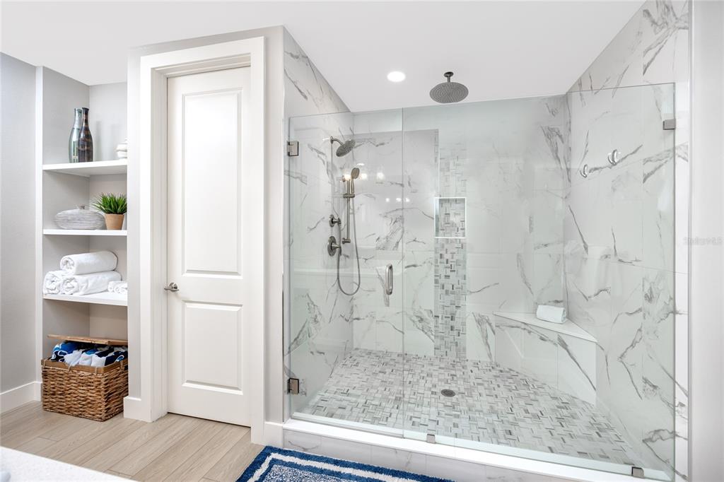 300 150th Avenue, Unit 502 Madeira Beach, FL 33708 - Photo 29 of 52 a bathroom with a shower