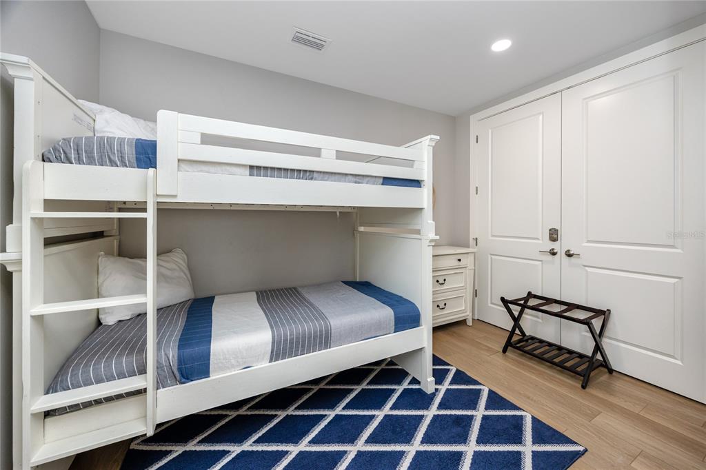 300 150th Avenue, Unit 502 Madeira Beach, FL 33708 - Photo 33 of 52 a hallway with cabinets