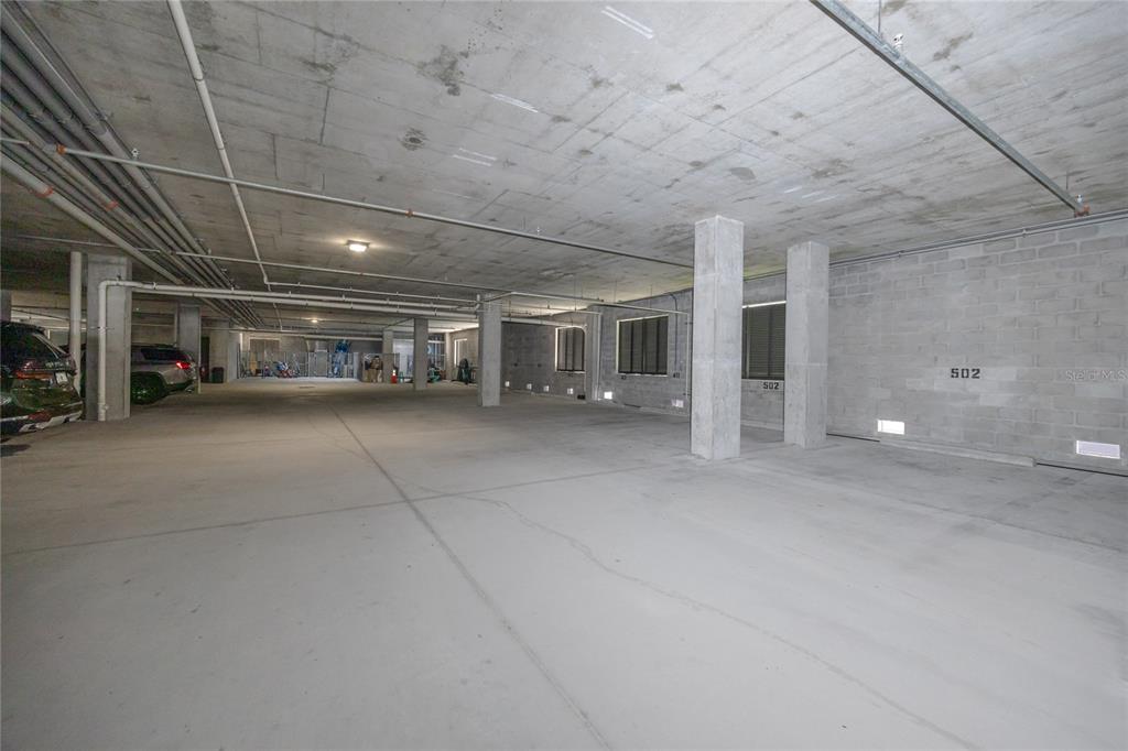 300 150th Avenue, Unit 502 Madeira Beach, FL 33708 - Photo 41 of 52 a view of parking area