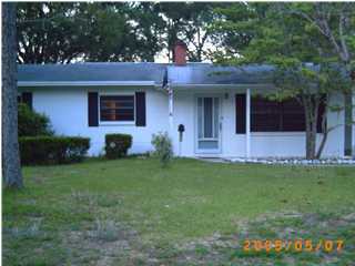420 Edge Avenue Valparaiso, FL 32580 - Photo 1 of 3 a view of a house with a garden