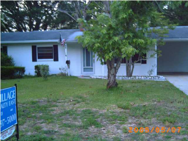 420 Edge Avenue Valparaiso, FL 32580 - Photo 3 of 3 a front view of a house with garden