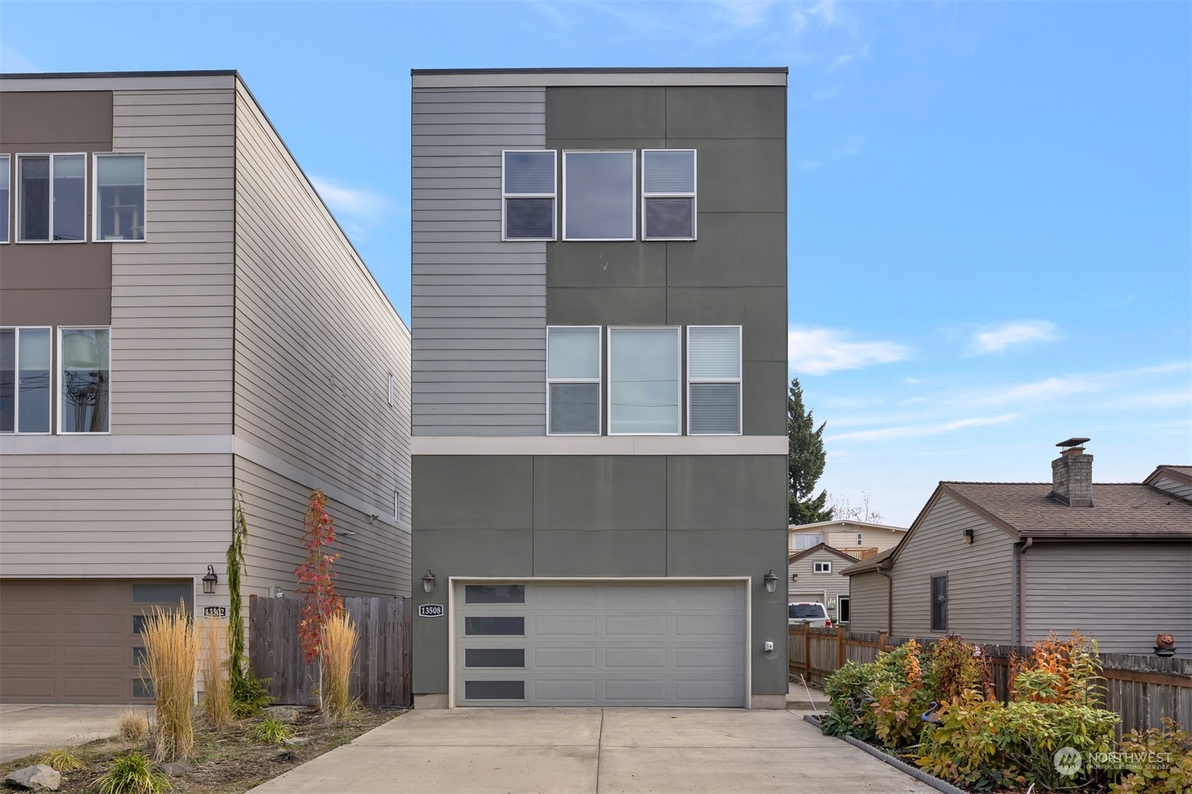13508 6th Avenue Southwest Burien, WA 98146 - Photo 1 of 39 a front view of a house with a garage