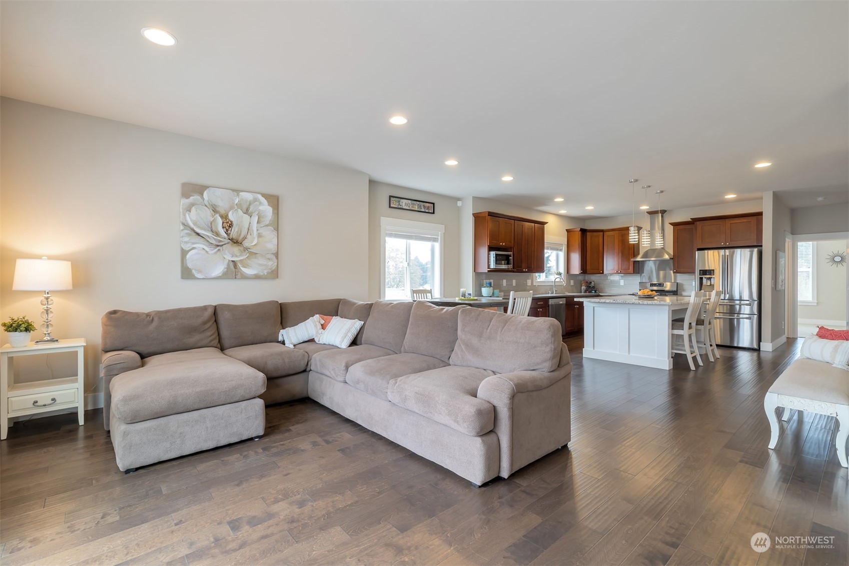13508 6th Avenue Southwest Burien, WA 98146 - Photo 2 of 39 a living room with furniture and kitchen view with wooden floor