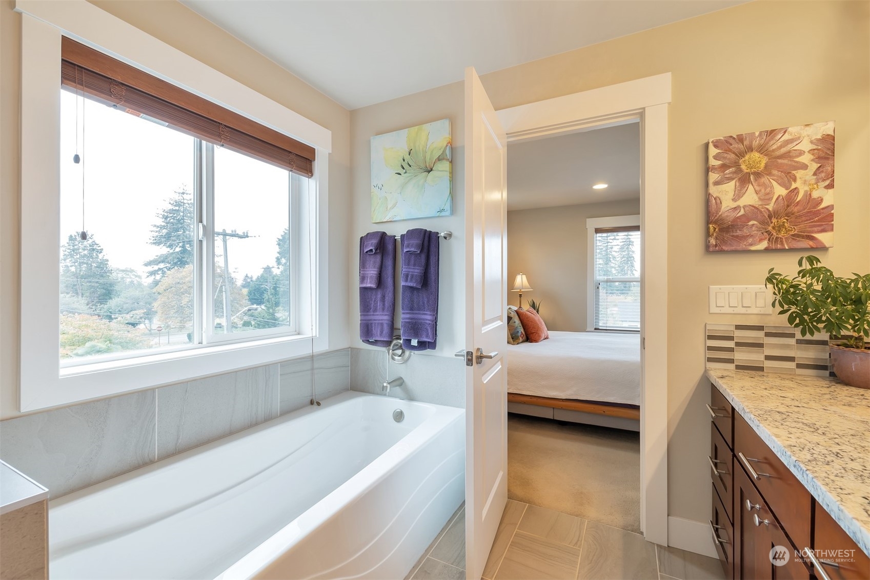 13508 6th Avenue Southwest Burien, WA 98146 - Photo 22 of 39 a bathroom with a granite countertop tub sink and mirror