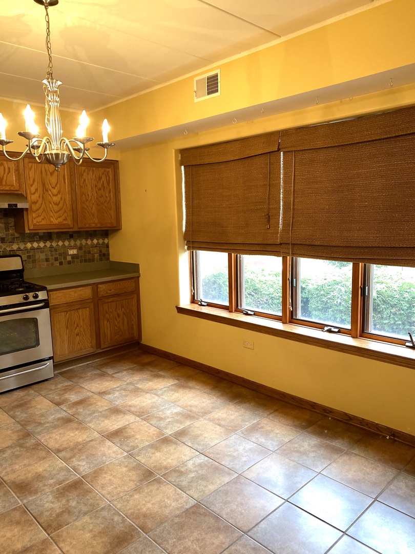 2321 183rd Street, Unit 101 Homewood, IL 60430 - Photo 15 of 27 a view of a kitchen with a large window