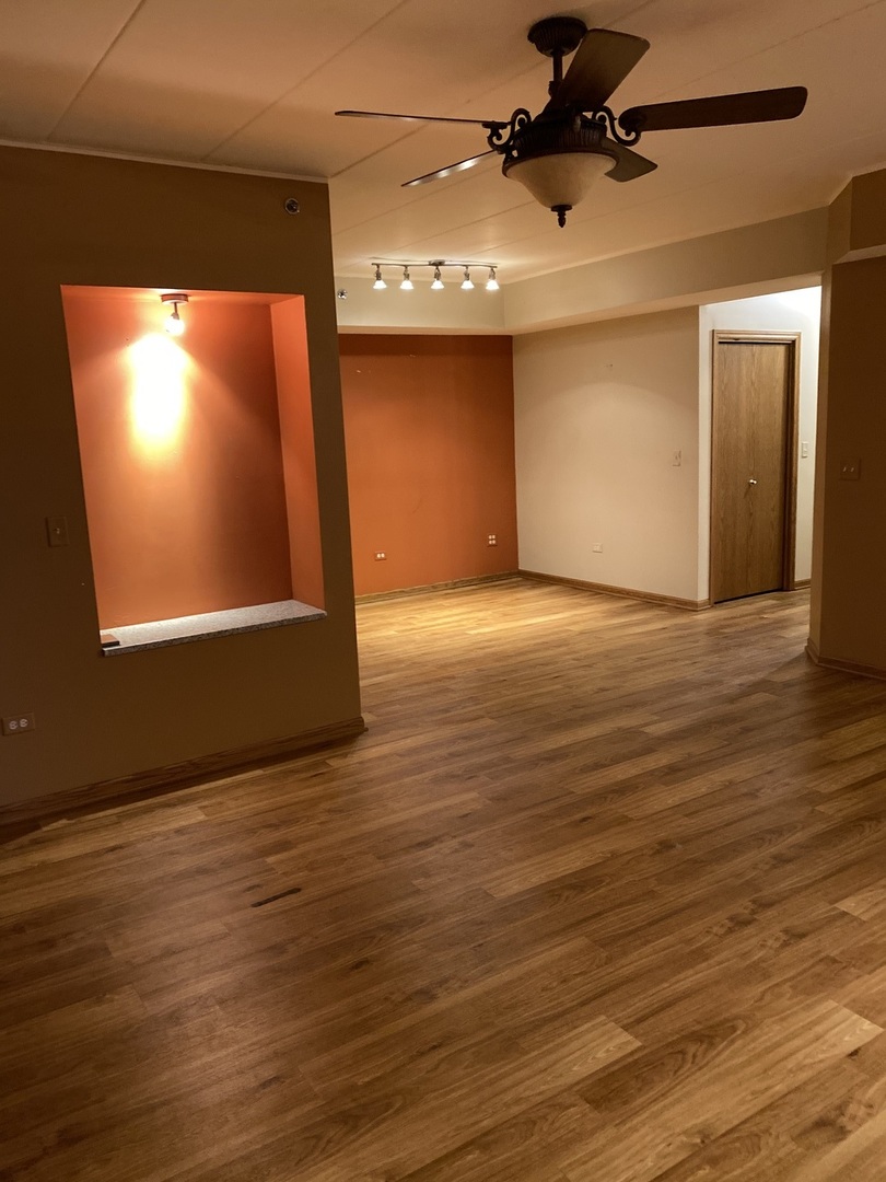 2321 183rd Street, Unit 101 Homewood, IL 60430 - Photo 7 of 27 a view of an empty room with a window