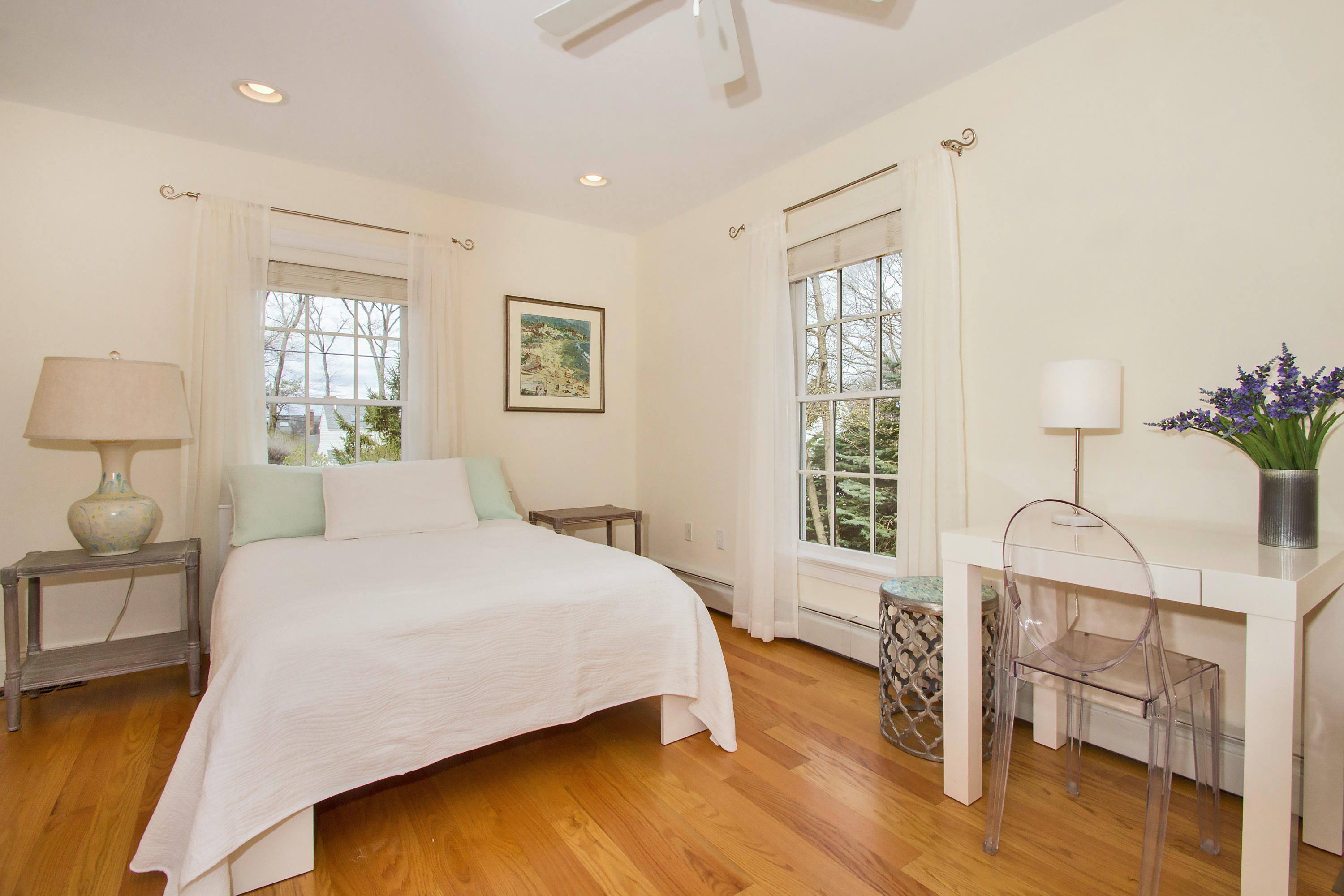 7 Ensign Road Norwalk, CT 06853 - Photo 16 of 25 a bedroom with a bed lamps and window