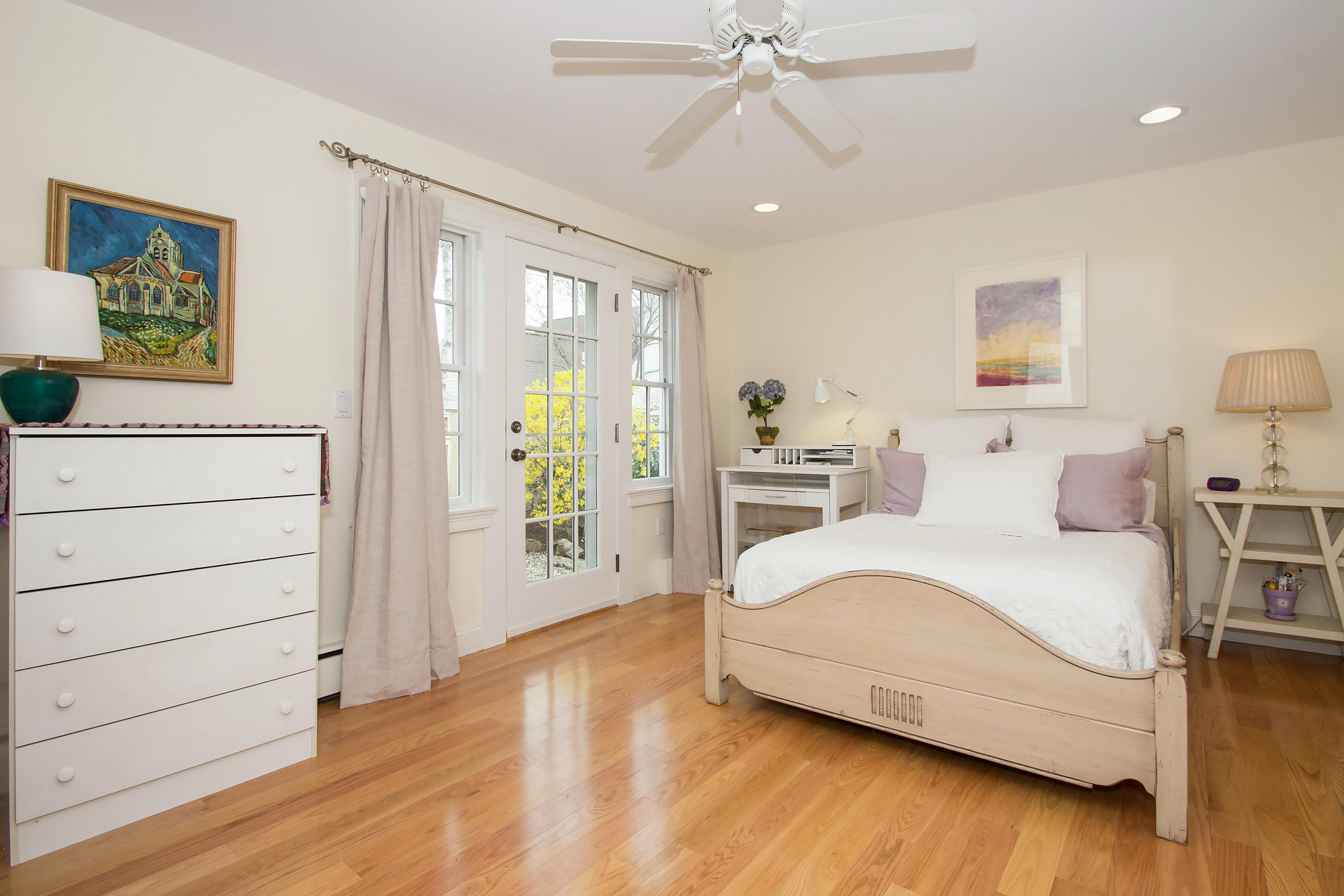 7 Ensign Road Norwalk, CT 06853 - Photo 17 of 25 a spacious bedroom with a bed and a dresser