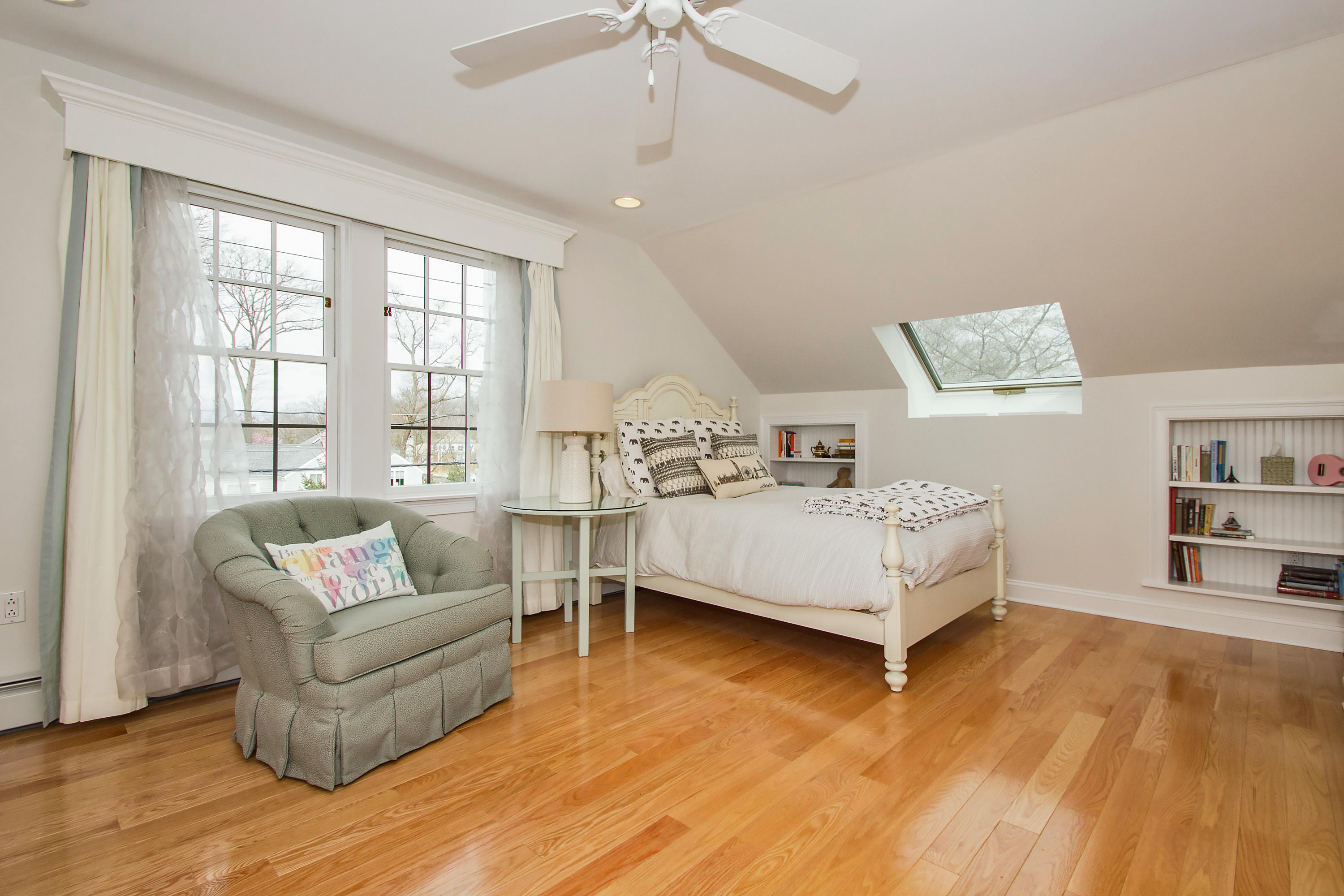 7 Ensign Road Norwalk, CT 06853 - Photo 18 of 25 a living room with furniture and a large window