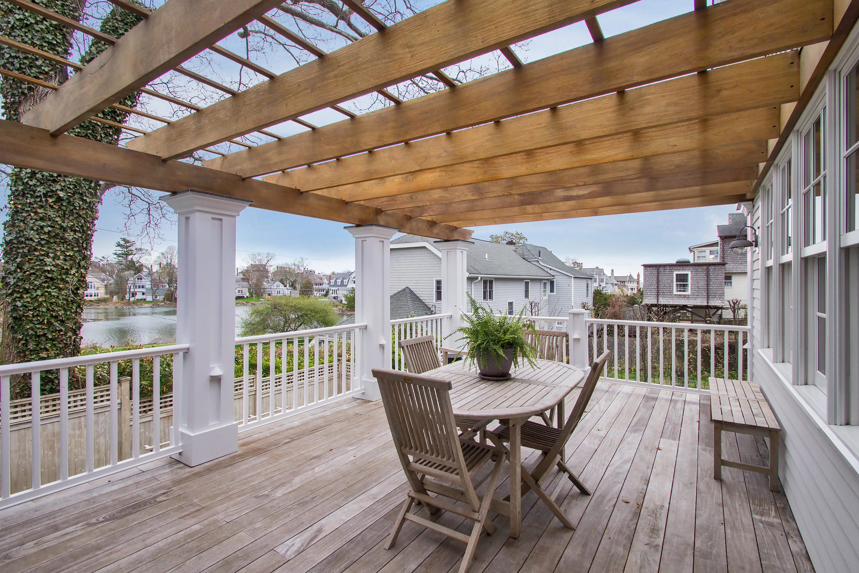 7 Ensign Road Norwalk, CT 06853 - Photo 3 of 25 a view of a chair and table on the deck
