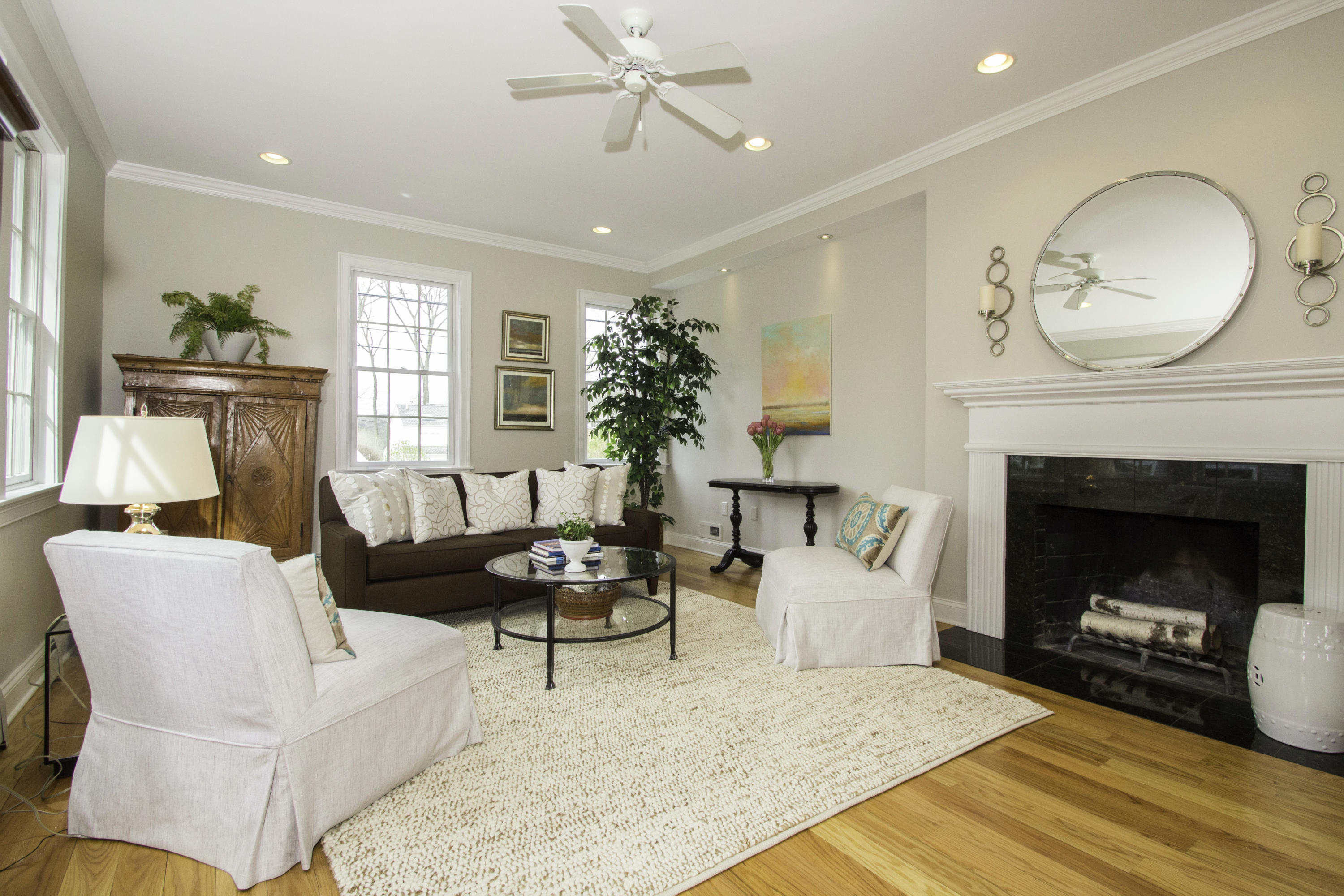 7 Ensign Road Norwalk, CT 06853 - Photo 5 of 25 a living room with furniture a window and a fireplace