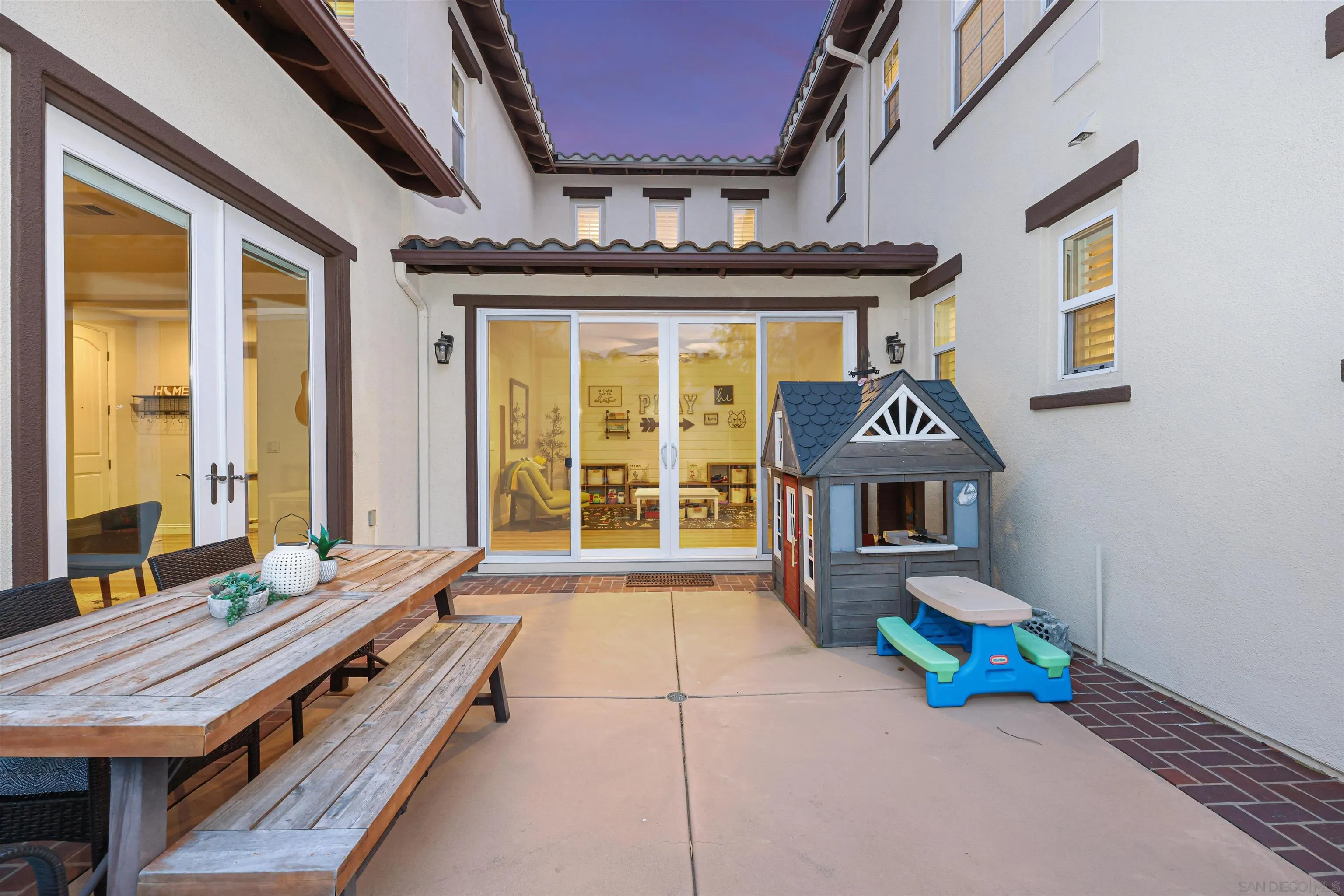 1431 Eclipse Drive San Marcos, CA 92078 - Photo 19 of 39 a living room with furniture pool table and a floor to ceiling window