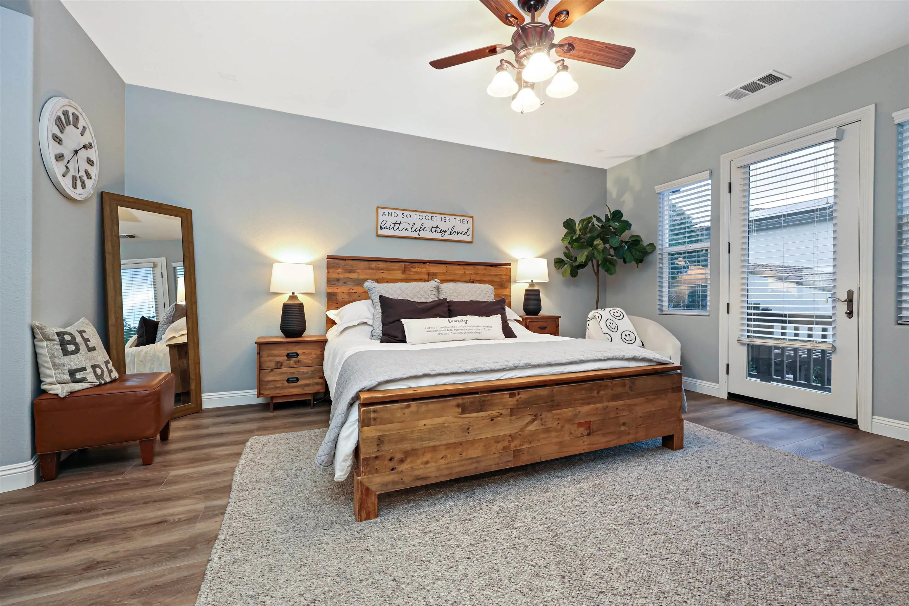 1431 Eclipse Drive San Marcos, CA 92078 - Photo 24 of 39 a bedroom with a bed a chandelier and a window