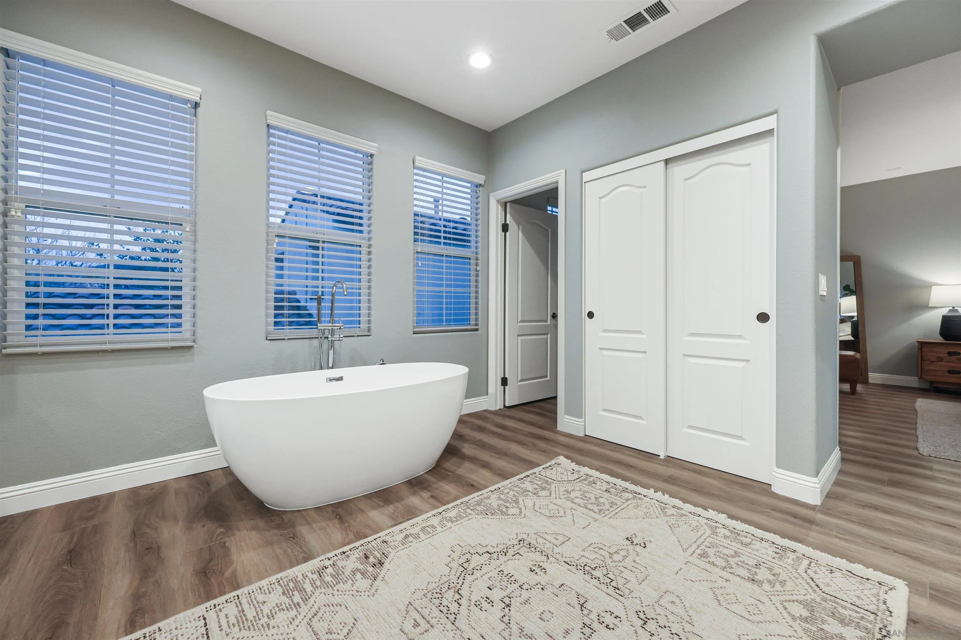 1431 Eclipse Drive San Marcos, CA 92078 - Photo 28 of 39 a bathroom with a bathtub and a shower