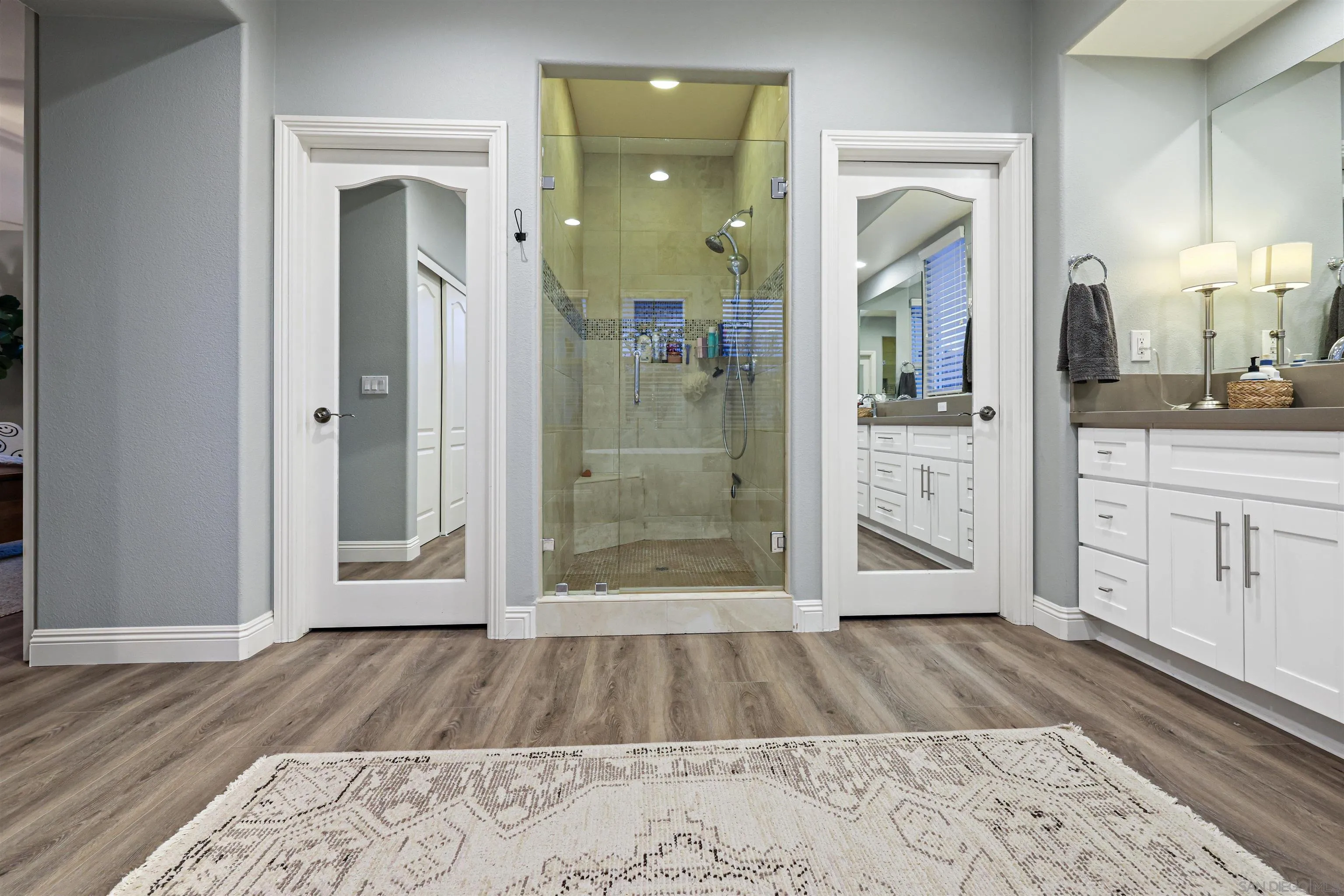 1431 Eclipse Drive San Marcos, CA 92078 - Photo 29 of 39 a bathroom with a sink and a mirror