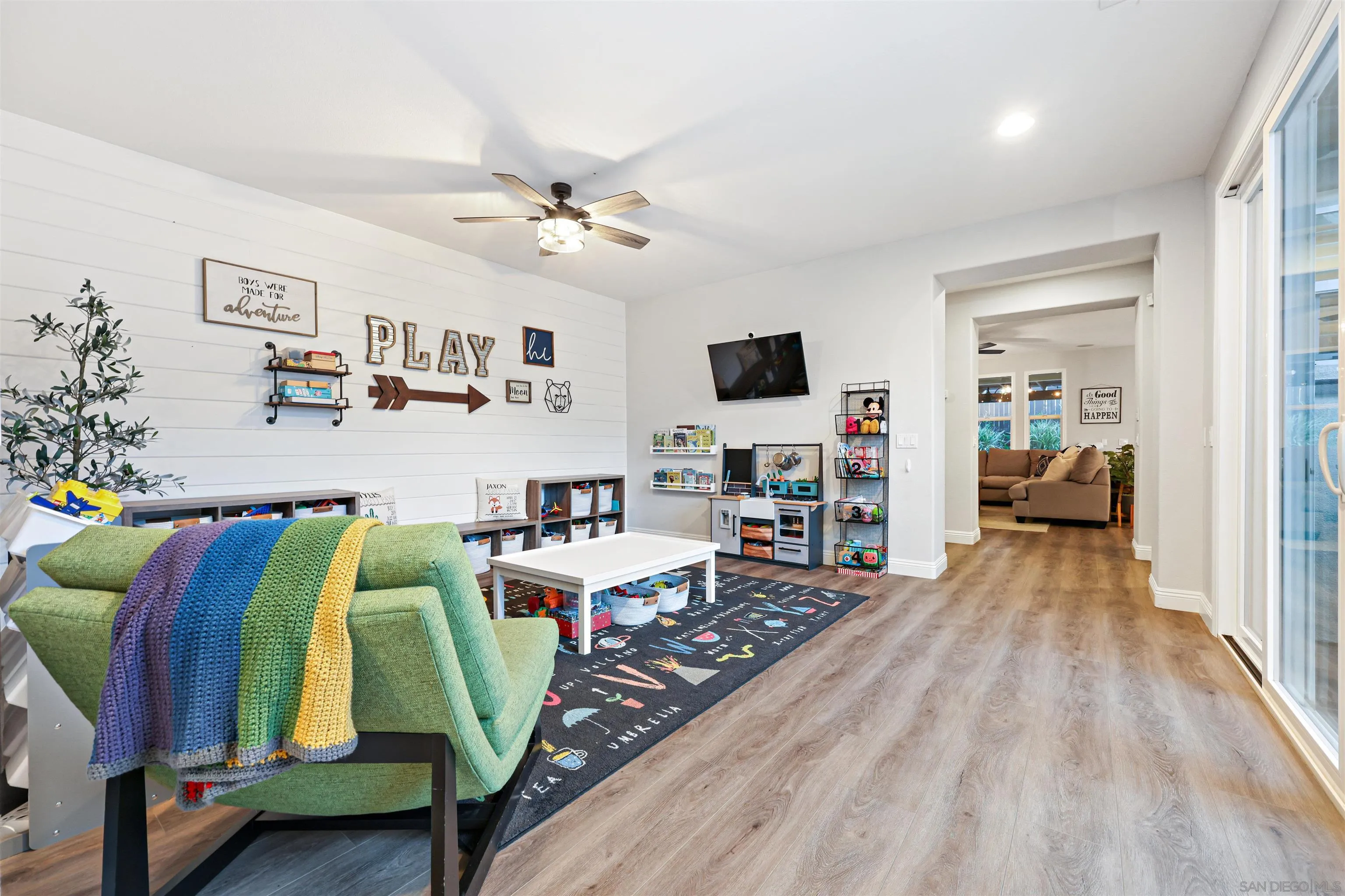 1431 Eclipse Drive San Marcos, CA 92078 - Photo 3 of 39 a living room with furniture and a wooden floor