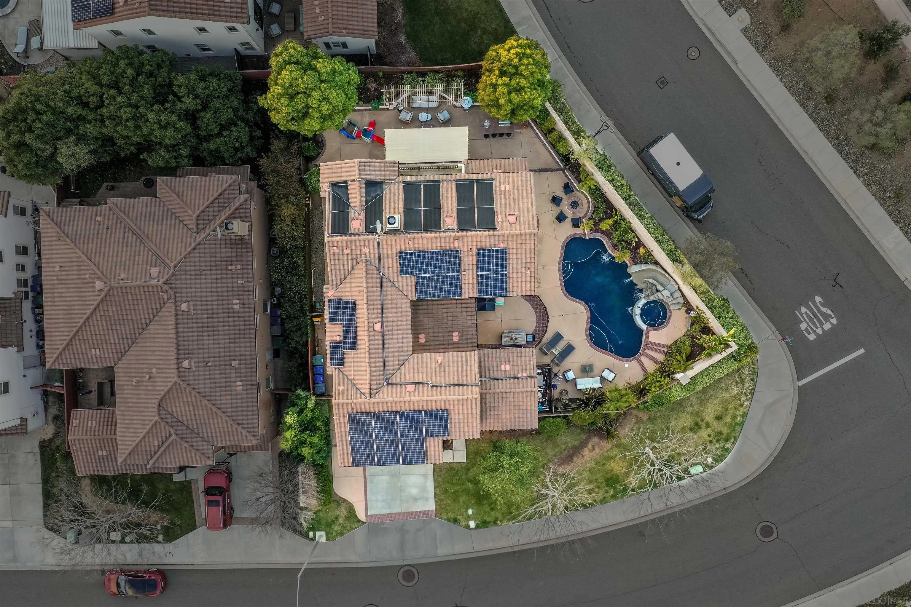 1431 Eclipse Drive San Marcos, CA 92078 - Photo 38 of 39 an aerial view of a house with a yard and potted plants