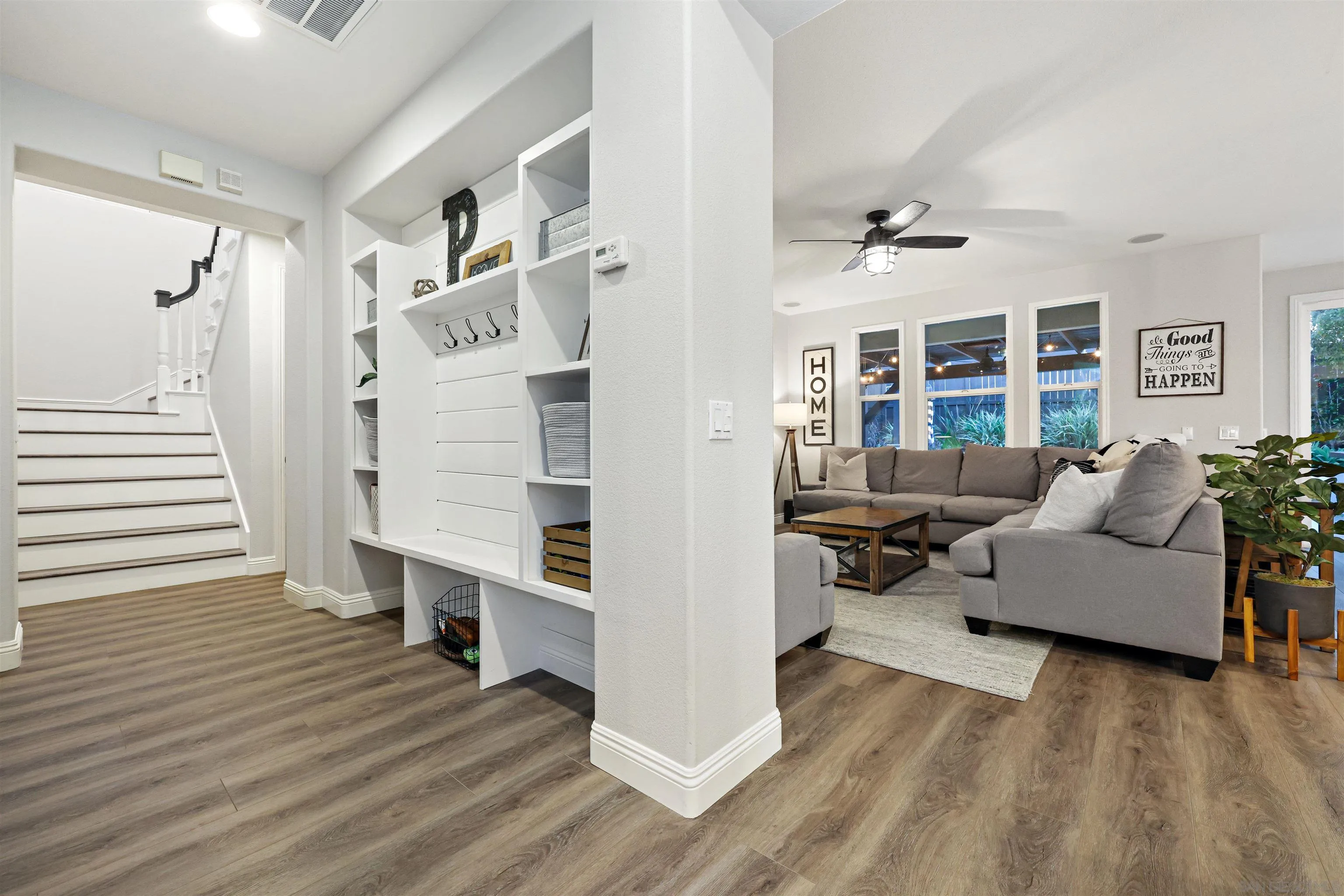 1431 Eclipse Drive San Marcos, CA 92078 - Photo 7 of 39 a living room with furniture and wooden floor