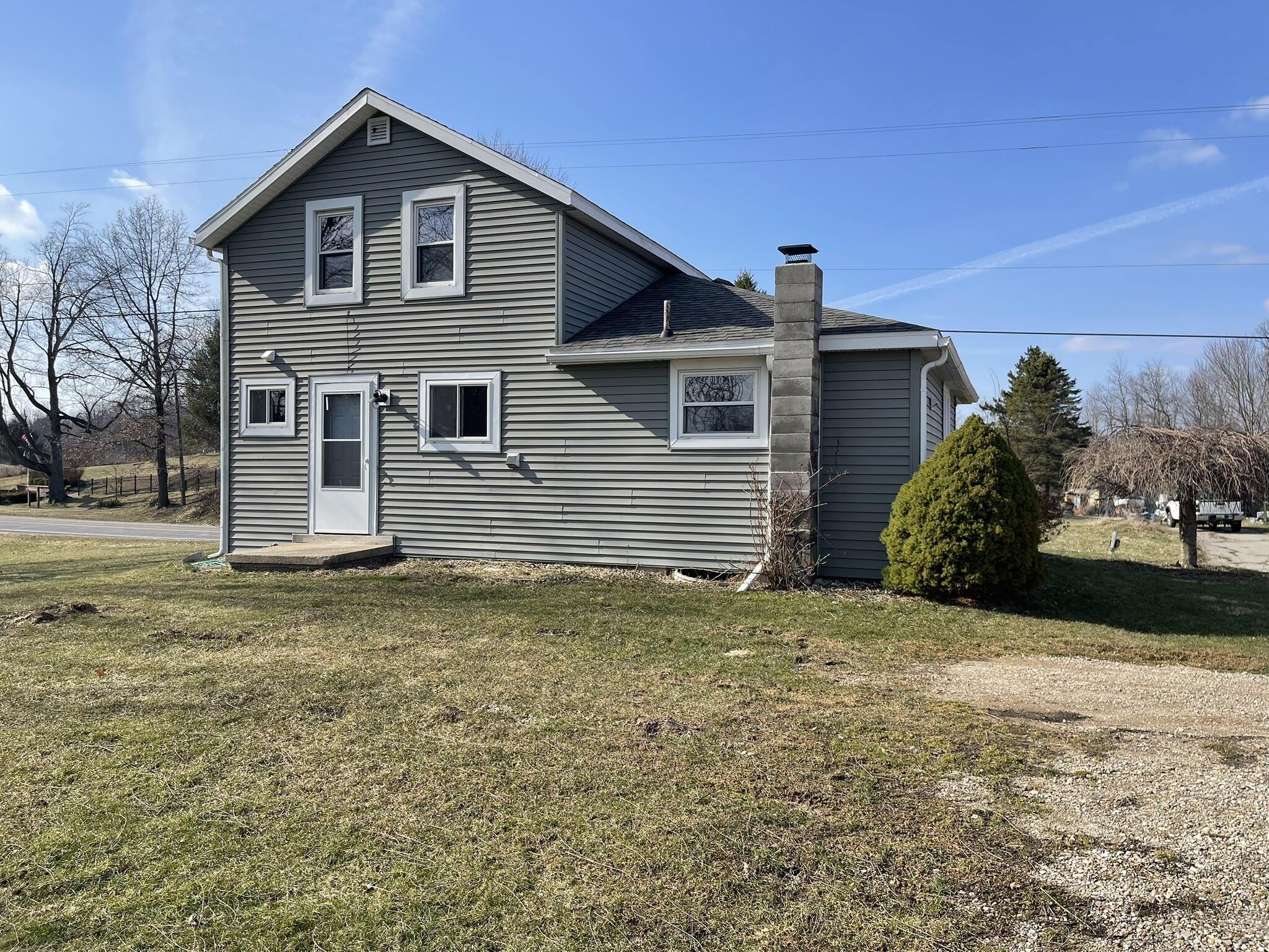 11602 Old Belding Road Northeast Belding, MI 48809 - Photo 4 of 21 Back Exterior
