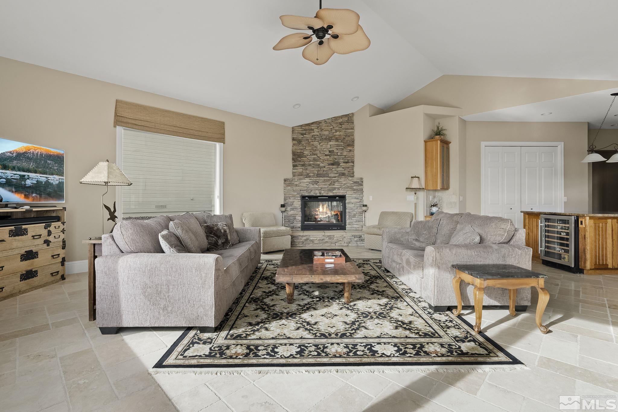 2425 Genoa Meadows Circle Genoa, NV 89411 - Photo 12 of 40 a living room with furniture and a rug