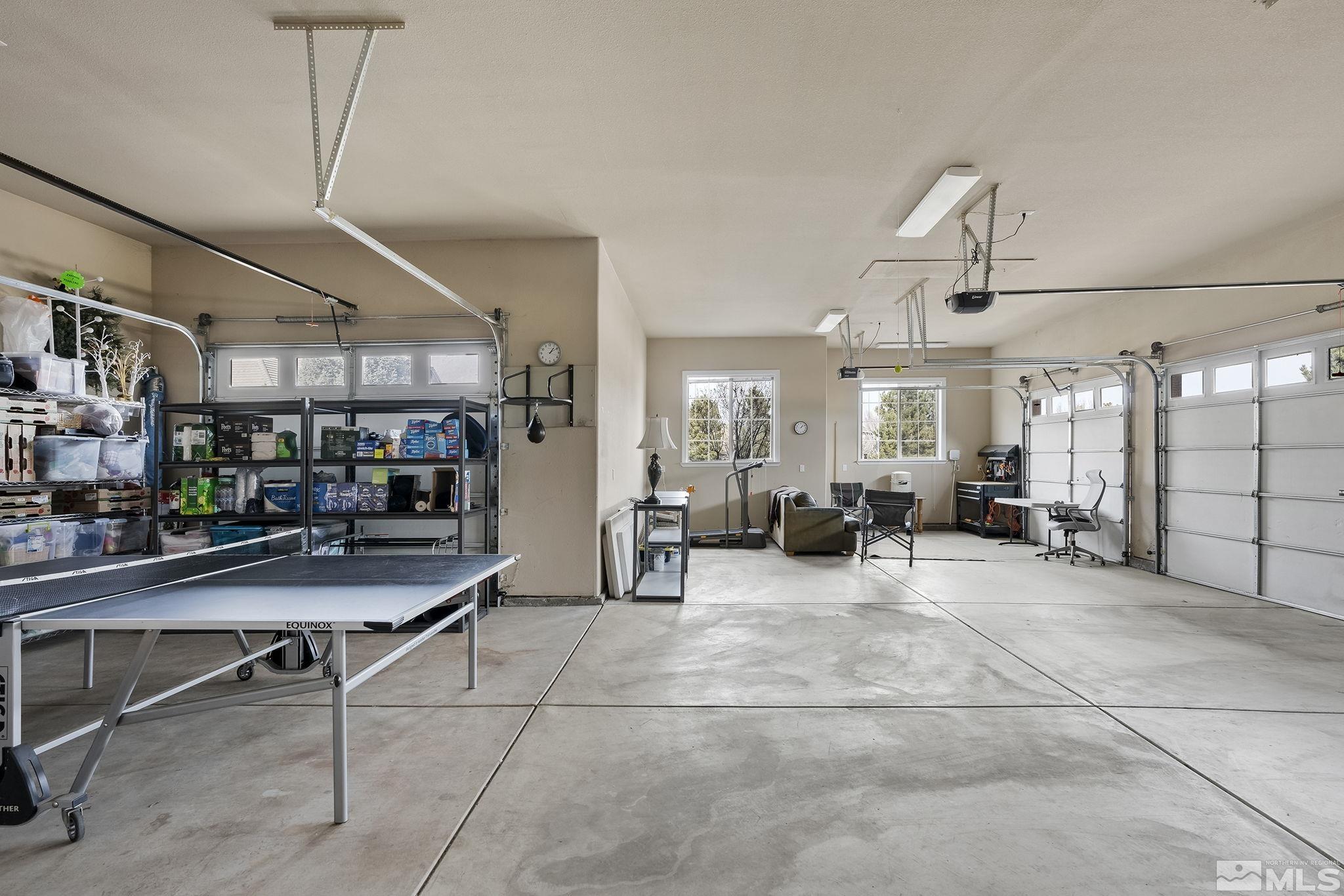 2425 Genoa Meadows Circle Genoa, NV 89411 - Photo 27 of 40 a view of a room with gym equipment and windows