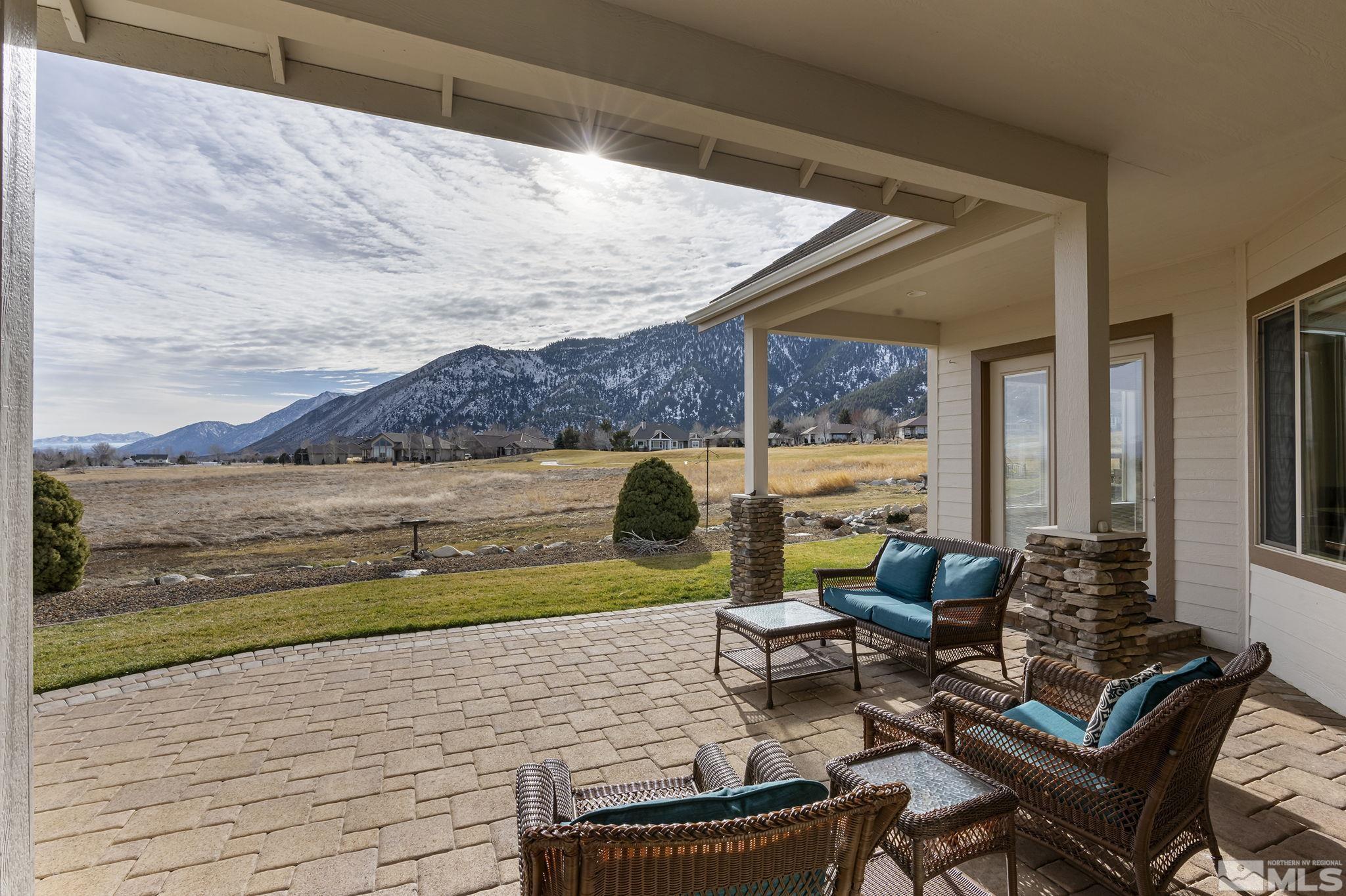 2425 Genoa Meadows Circle Genoa, NV 89411 - Photo 28 of 40 a view of swimming pool with seating area and furniture