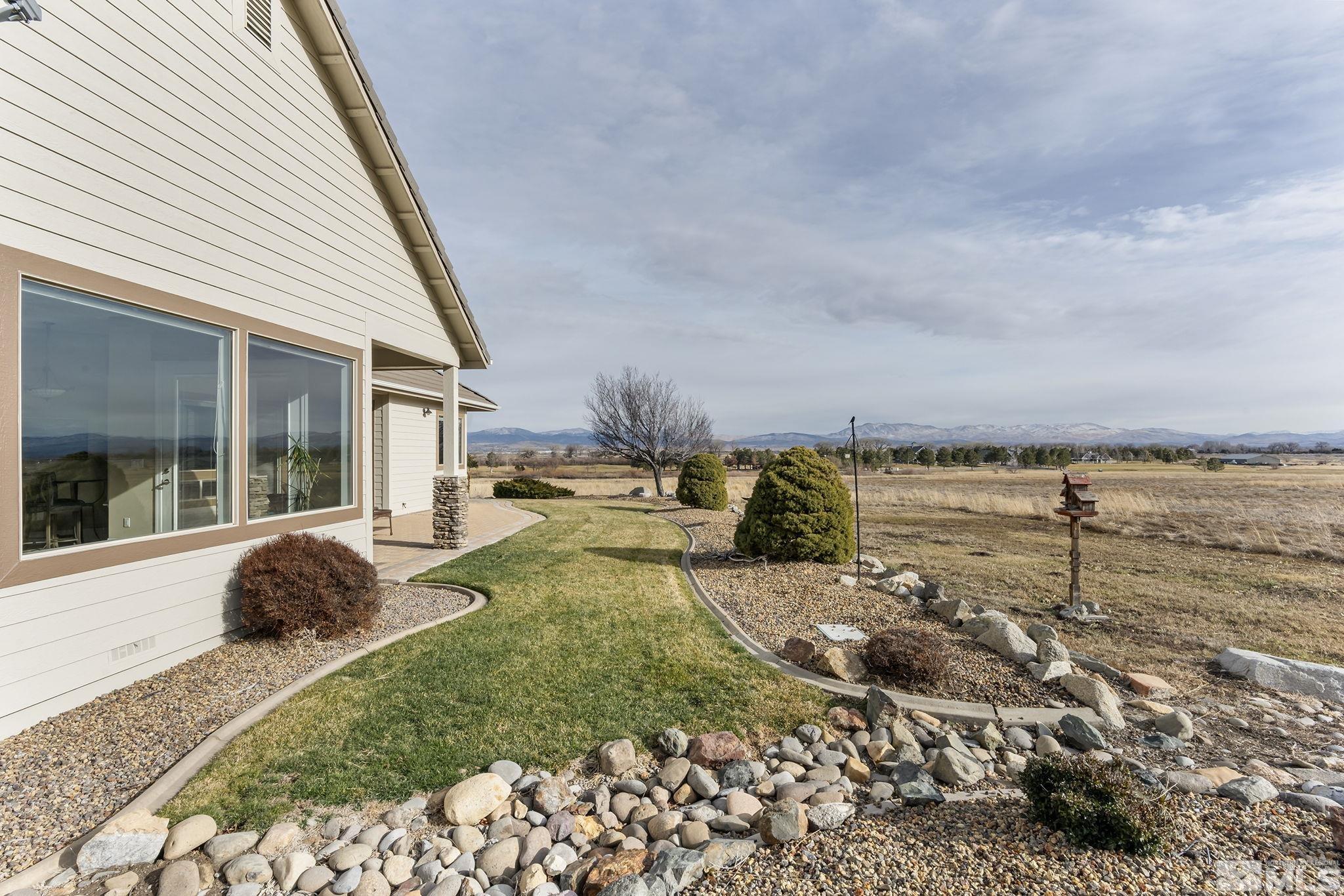 2425 Genoa Meadows Circle Genoa, NV 89411 - Photo 33 of 40 a house view with a outdoor space