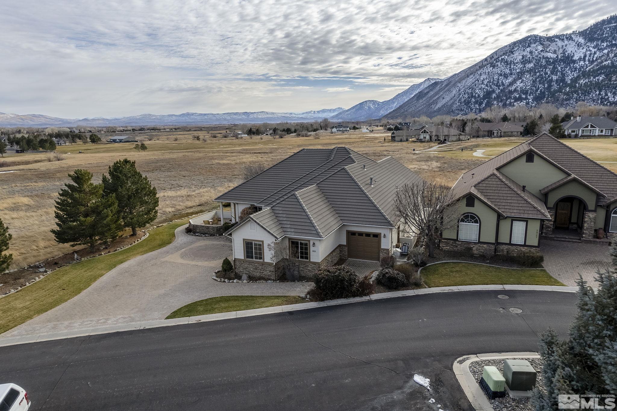 2425 Genoa Meadows Circle Genoa, NV 89411 - Photo 38 of 40 a view of a house with a ocean view