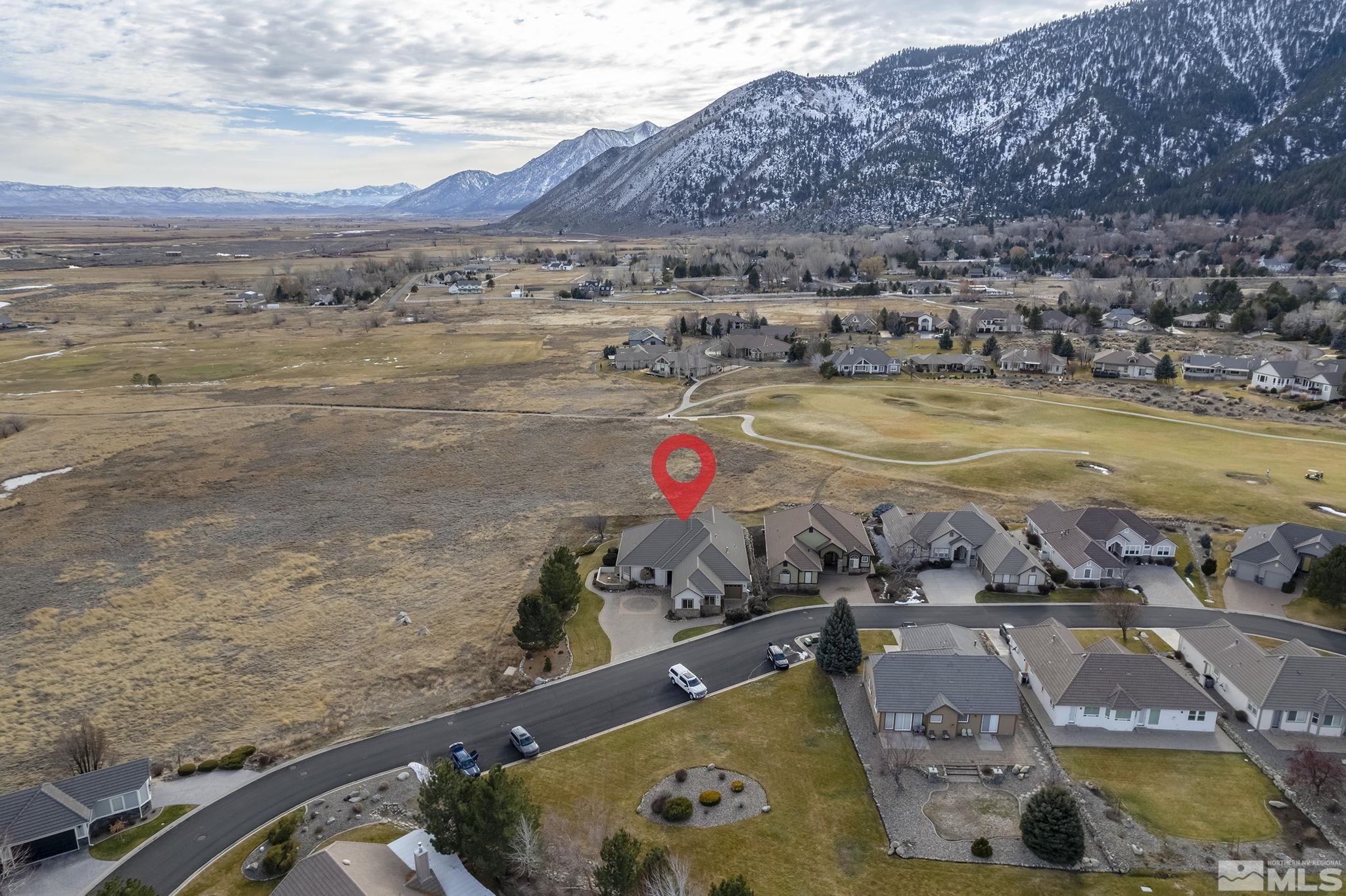 2425 Genoa Meadows Circle Genoa, NV 89411 - Photo 4 of 40 a view of swimming pool with an ocean view
