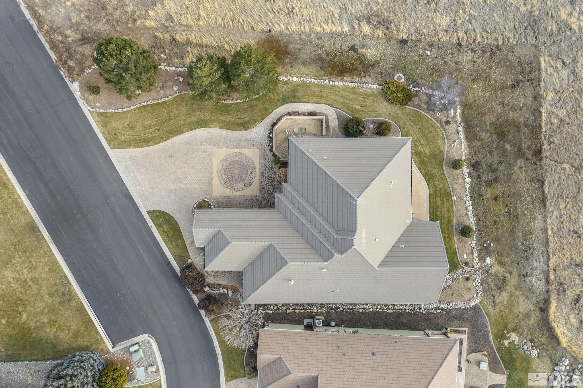 2425 Genoa Meadows Circle Genoa, NV 89411 - Photo 5 of 40 a picture of a table and chairs in the balcony