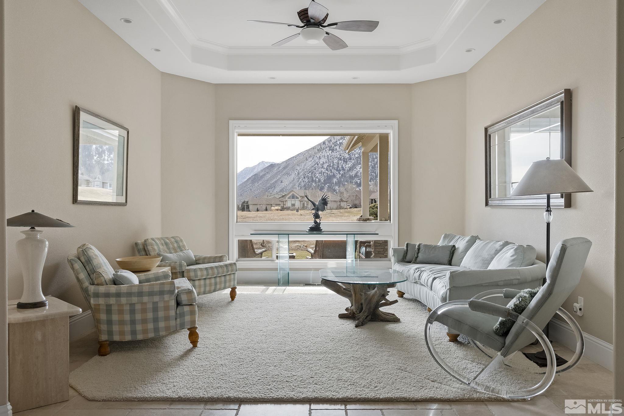 2425 Genoa Meadows Circle Genoa, NV 89411 - Photo 6 of 40 a living room with furniture and a window