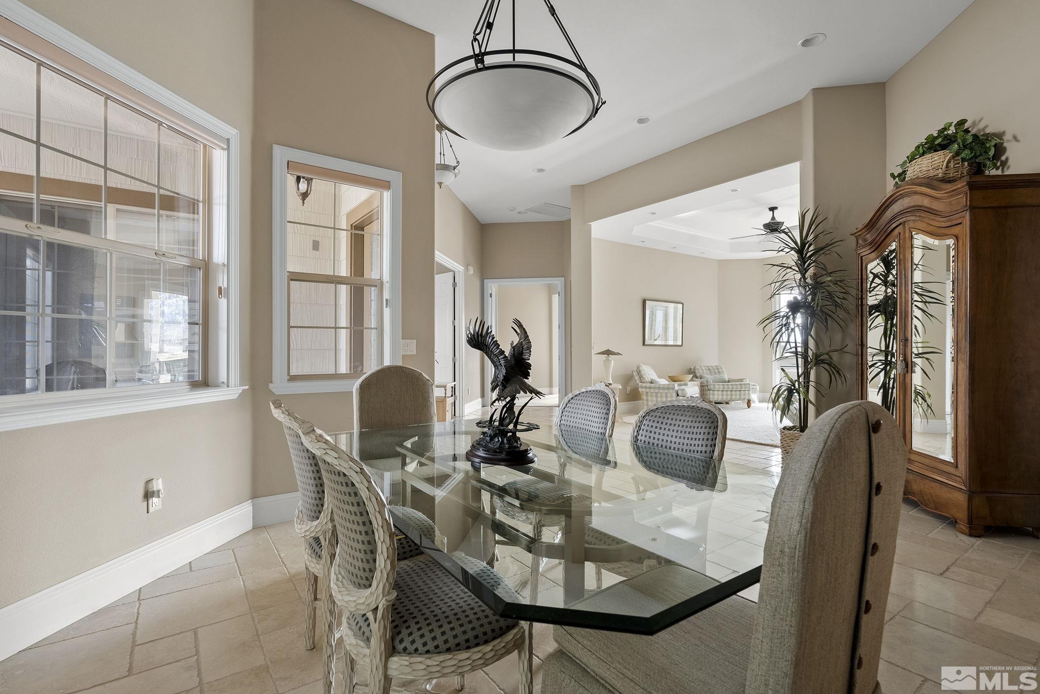 2425 Genoa Meadows Circle Genoa, NV 89411 - Photo 10 of 40 a dining room with furniture and window