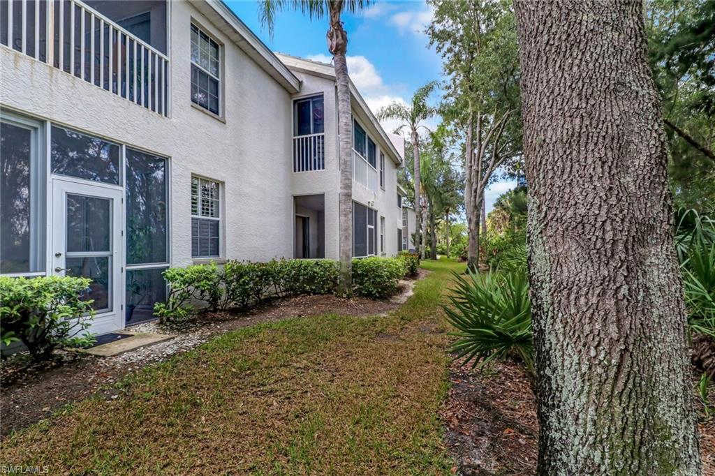 3765 Fieldstone Boulevard, Unit 1304 Naples, FL 34109 - Photo 27 of 33 a view of a pathway with a house