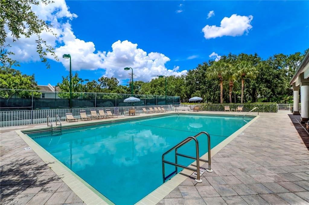 3765 Fieldstone Boulevard, Unit 1304 Naples, FL 34109 - Photo 30 of 33 a view of a swimming pool