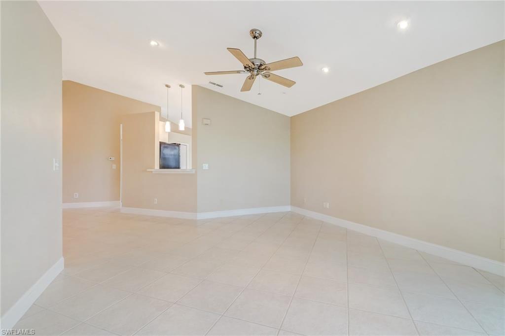 3765 Fieldstone Boulevard, Unit 1304 Naples, FL 34109 - Photo 8 of 33 a view of an empty room