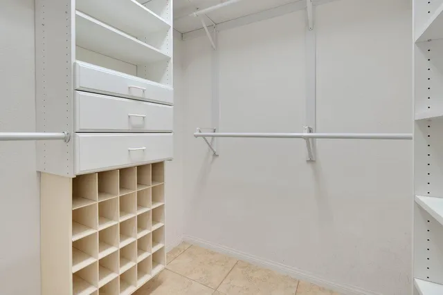 a view of an empty walk in closet