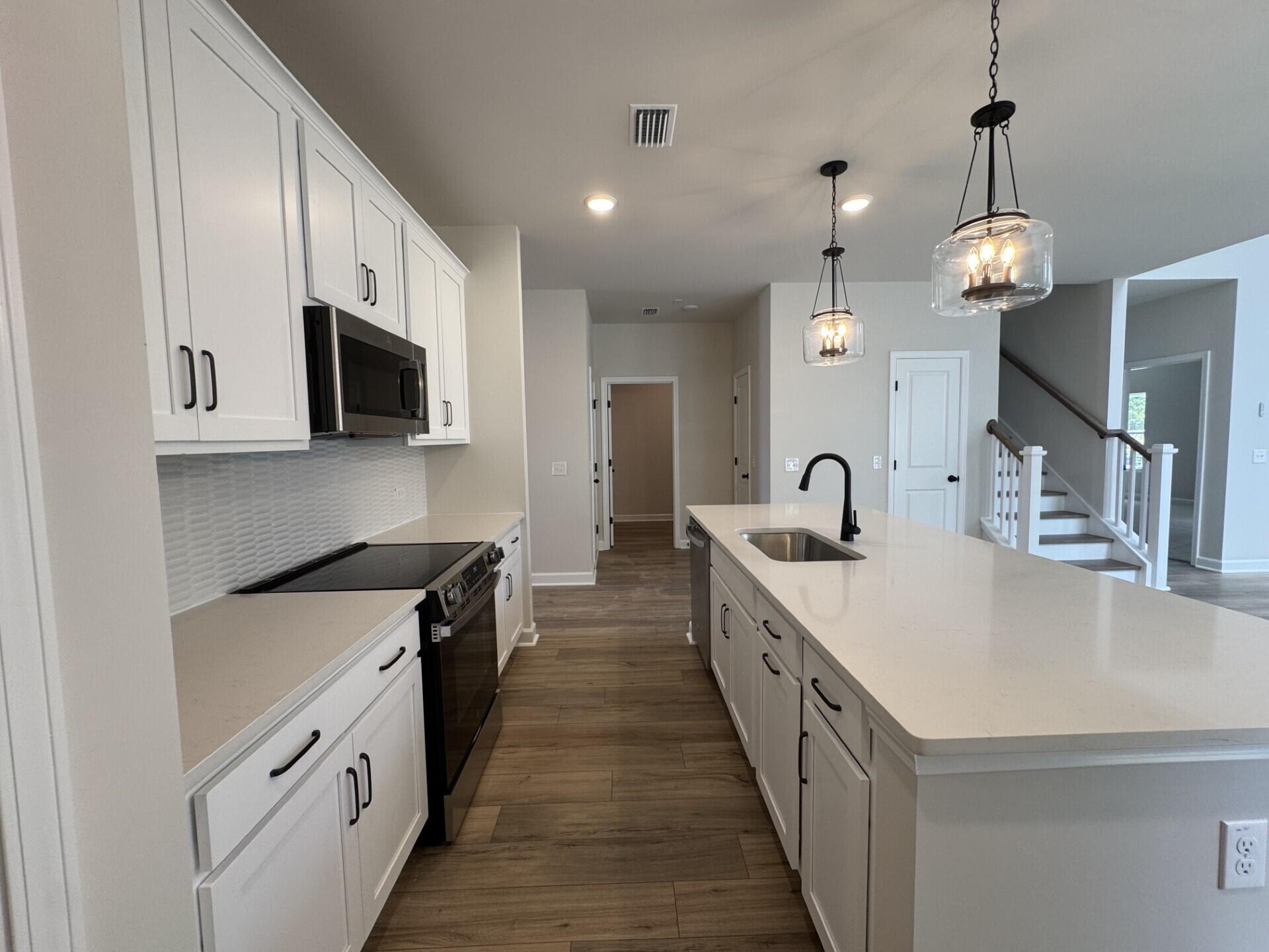 2074 Lavender Bloom Road Ravenel, SC 29470 - Photo 11 of 49 Lot 91 Kitchen and Island