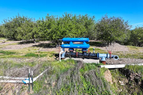 a view of a chairs and table in a parking
