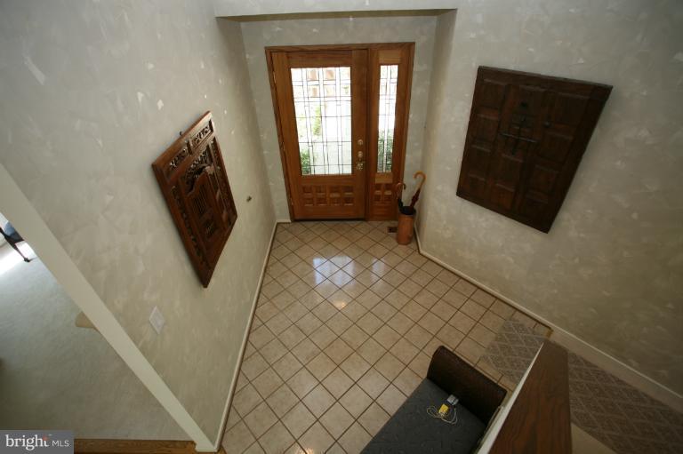 10927 Lawyers Road Reston, VA 20191 - Photo 11 of 30 a living room with a toilet and a flat screen tv