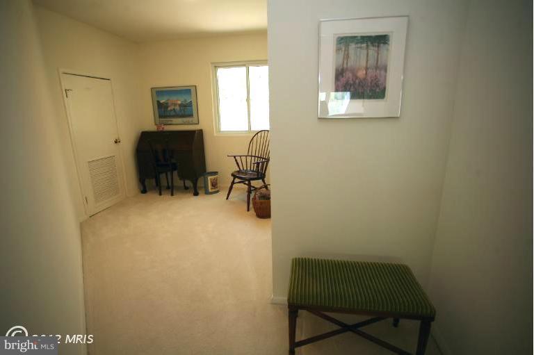 10927 Lawyers Road Reston, VA 20191 - Photo 15 of 30 a room with furniture and a window