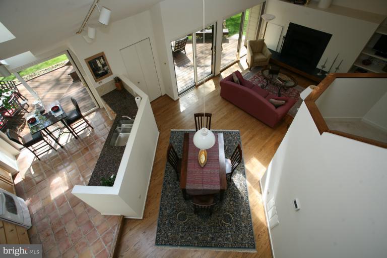 10927 Lawyers Road Reston, VA 20191 - Photo 26 of 30 a living room with furniture and a flat screen tv