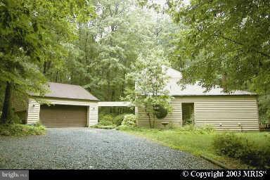 10927 Lawyers Road Reston, VA 20191 - Photo 28 of 30 front view of a house with a yard