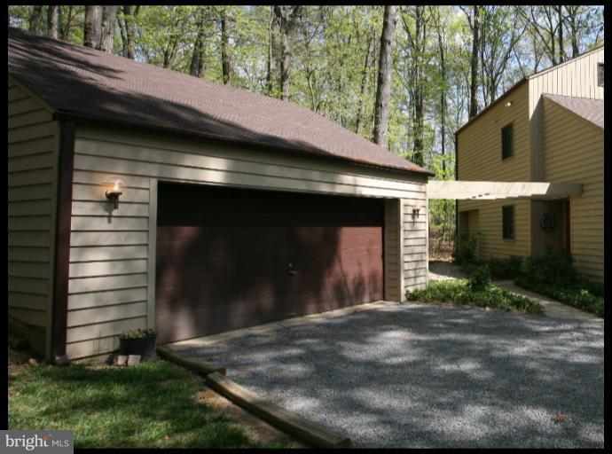 10927 Lawyers Road Reston, VA 20191 - Photo 30 of 30 a view of a house with a small yard